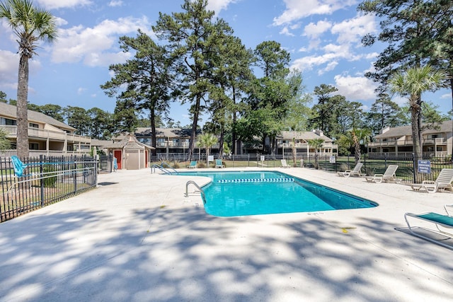 3015 Old Bryan Dr Unit 10-7, Myrtle Beach, SC 29577 - pool featuring a shed, a patio area, and fence