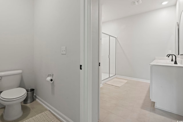 full bath featuring toilet, a stall shower, tile patterned flooring, vanity, and baseboards