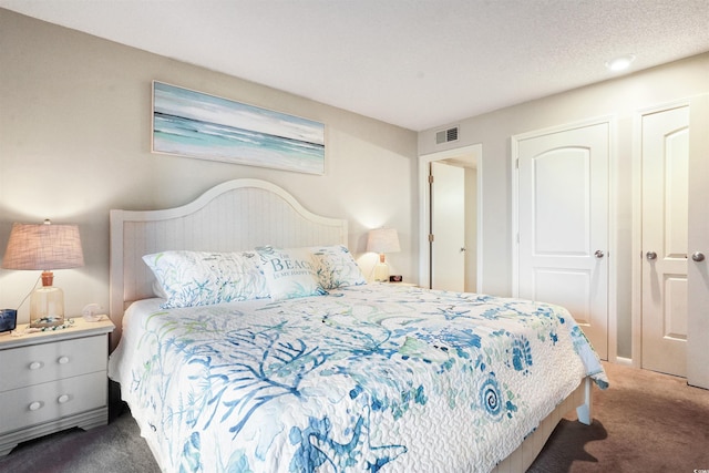 223 Maison Dr Unit F-4, Myrtle Beach, SC 29572 - carpeted bedroom featuring a textured ceiling and visible vents