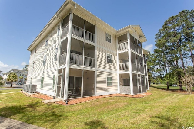 646 Tupelo Ln Unit 4E, Longs, SC 29568 - rear view of house with a lawn