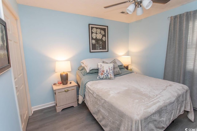 646 Tupelo Ln Unit 4E, Longs, SC 29568 - bedroom featuring dark wood-type flooring and a ceiling fan