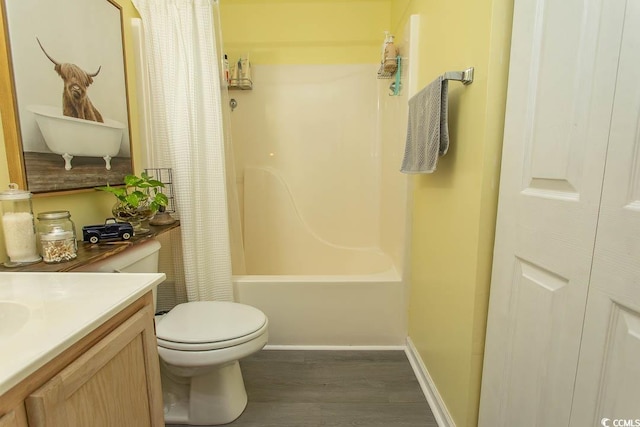 646 Tupelo Ln Unit 4E, Longs, SC 29568 - bathroom featuring wood finished floors, vanity, and shower / bath combo with shower curtain