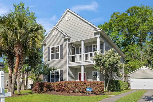 405 Emerson Dr, Myrtle Beach, SC 29579 - view of front of property with a detached garage, an outdoor structure, and a balcony