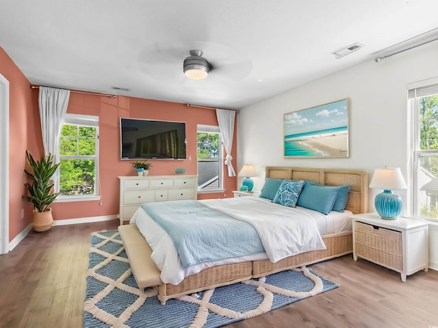 405 Emerson Dr, Myrtle Beach, SC 29579 - bedroom featuring light wood-style floors, baseboards, a ceiling fan, and visible vents