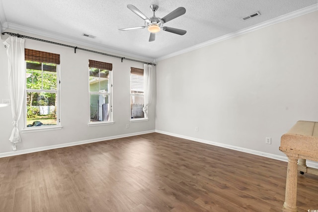 405 Emerson Dr, Myrtle Beach, SC 29579 - empty room featuring visible vents, a ceiling fan, a textured ceiling, crown molding, and wood finished floors