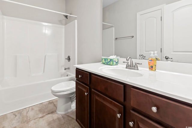 full bathroom featuring toilet, vanity, washtub / shower combination, and tile patterned floors