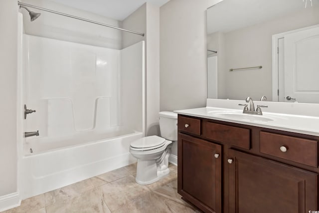 bathroom with toilet, shower / tub combination, vanity, and baseboards
