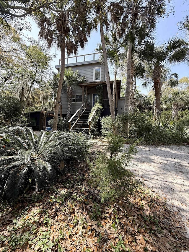4113 Buccaneer Rd, Isle Of Palms, SC 29451 - view of front of house featuring stairs