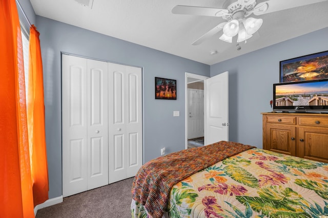 carpeted bedroom featuring a closet and a ceiling fan