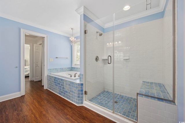 1114 S Dogwood Dr, Surfside Beach, SC 29575 - full bath featuring crown molding, a bath, a shower stall, and wood finished floors