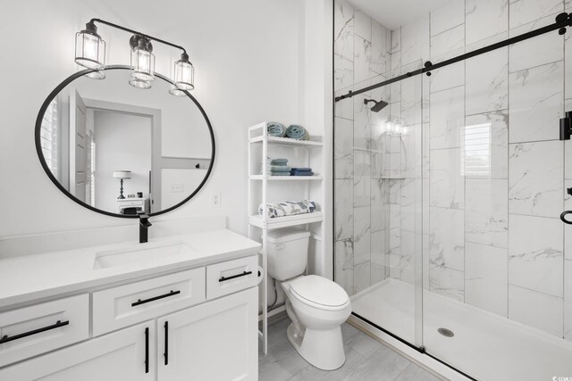 35 Red Skiff Ln Unit 35, Pawleys Island, SC 29585 - full bath featuring a marble finish shower, vanity, and toilet