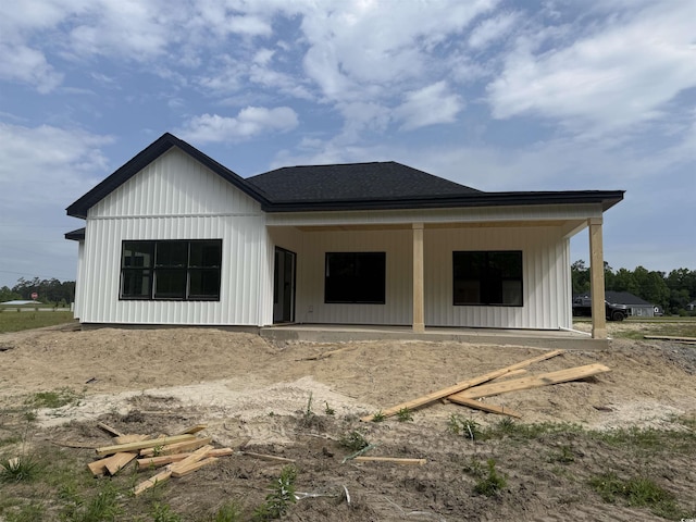 204 Shady Pines Ct, Conway, SC 29527 - back of property featuring a porch, board and batten siding, and roof with shingles