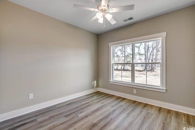204 Shady Pines Ct, Conway, SC 29527 - spare room with wood finished floors, baseboards, and ceiling fan