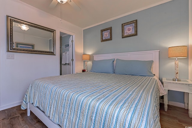 bedroom featuring crown molding, ceiling fan, wood finished floors, and baseboards