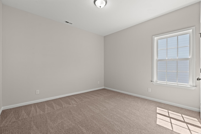 1513 Anne St, North Myrtle Beach, SC 29582 - carpeted empty room with baseboards