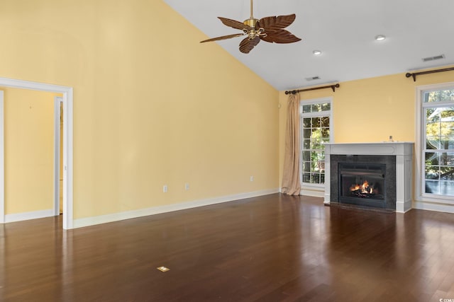 808 E Coast Ln, North Myrtle Beach, SC 29582 - unfurnished living room with high vaulted ceiling, a glass covered fireplace, wood finished floors, ceiling fan, and recessed lighting