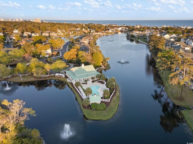 birds eye view of property featuring a residential view and a water view