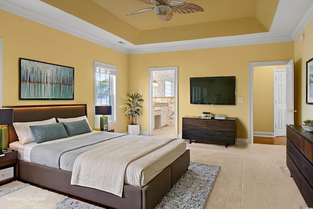808 E Coast Ln, North Myrtle Beach, SC 29582 - bedroom featuring ornamental molding, a raised ceiling, carpet flooring, connected bathroom, and a ceiling fan