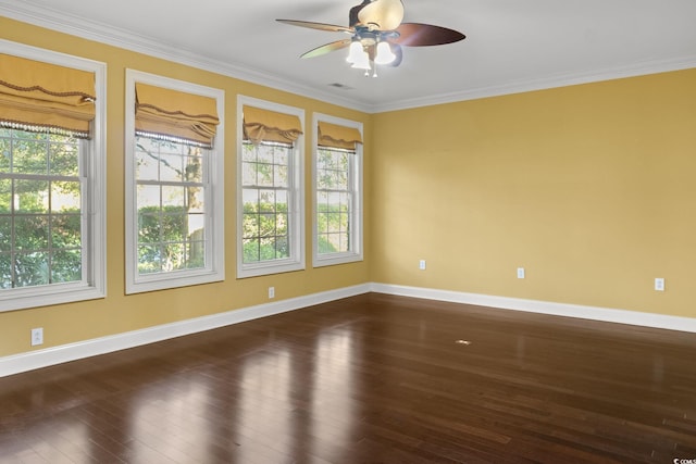 808 E Coast Ln, North Myrtle Beach, SC 29582 - spare room featuring healthy amount of natural light, ceiling fan, crown molding, and dark wood-style floors
