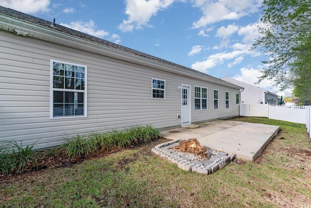 180 Oak Crest Cir, Longs, SC 29568 - rear view of house featuring a patio and an outdoor fire pit