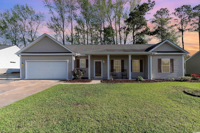 180 Oak Crest Cir, Longs, SC 29568 - single story home with an attached garage, covered porch, driveway, and a yard