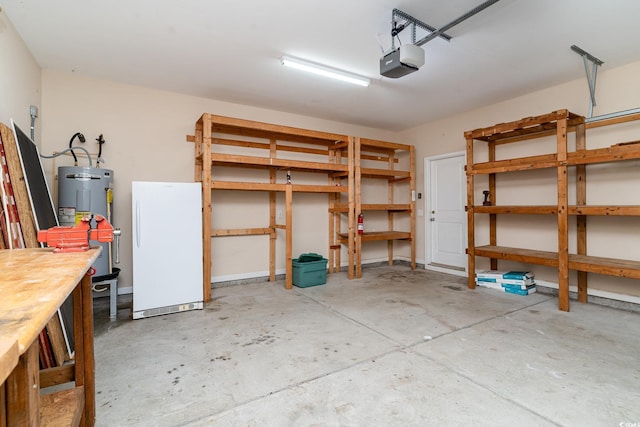 180 Oak Crest Cir, Longs, SC 29568 - garage with freestanding refrigerator, a garage door opener, and water heater
