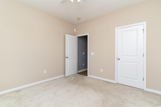 180 Oak Crest Cir, Longs, SC 29568 - unfurnished bedroom featuring carpet floors, baseboards, and a ceiling fan