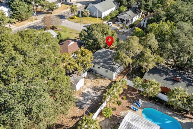 birds eye view of property with a residential view