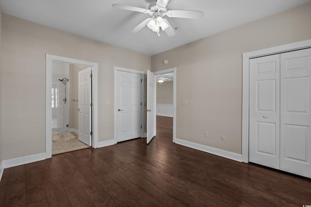 4891 Luster Leaf Cir Unit 301, Myrtle Beach, SC 29577 - unfurnished bedroom featuring wood finished floors, ensuite bathroom, a closet, and a ceiling fan