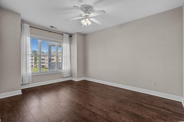 4891 Luster Leaf Cir Unit 301, Myrtle Beach, SC 29577 - spare room featuring dark wood-style floors and ceiling fan