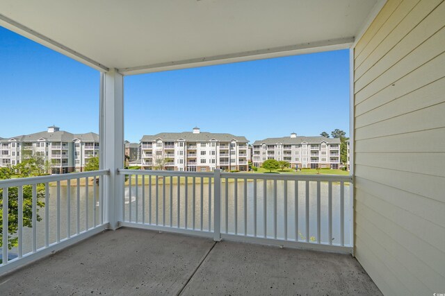 4891 Luster Leaf Cir Unit 301, Myrtle Beach, SC 29577 - balcony with a residential view and a water view
