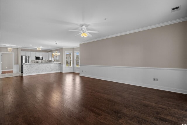 4891 Luster Leaf Cir Unit 301, Myrtle Beach, SC 29577 - unfurnished living room with ceiling fan, a chandelier, dark wood-style floors, ornamental molding, and recessed lighting