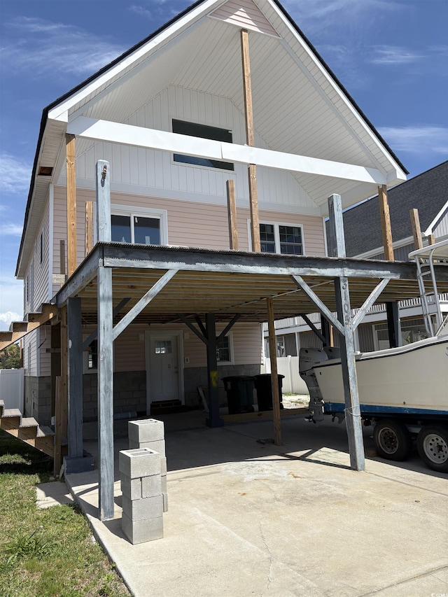 view of vehicle parking with a carport