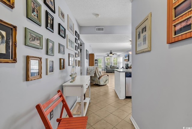 157 Egret Run Ln Unit 514, Pawleys Island, SC 29585 - corridor with a textured ceiling and light tile patterned floors