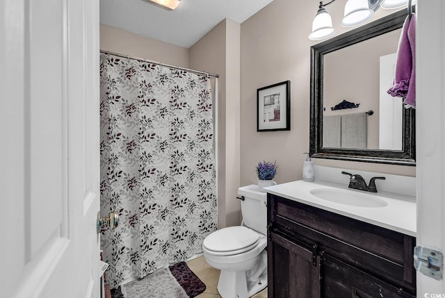 157 Egret Run Ln Unit 514, Pawleys Island, SC 29585 - bathroom featuring vanity, curtained shower, tile patterned flooring, and a textured ceiling