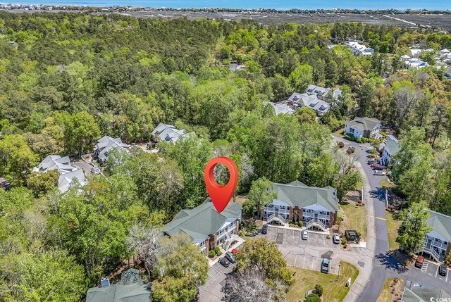 157 Egret Run Ln Unit 514, Pawleys Island, SC 29585 - aerial overview of property's location featuring a forest and nearby suburban area