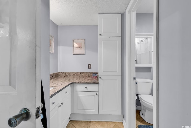 157 Egret Run Ln Unit 514, Pawleys Island, SC 29585 - full bath with tile patterned floors, a textured ceiling, and vanity