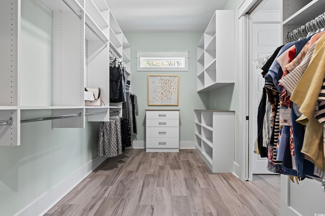 1006 Surf Pointe Dr, North Myrtle Beach, SC 29582 - walk in closet featuring light wood-style floors