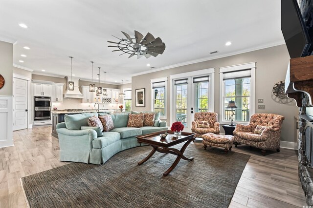 1006 Surf Pointe Dr, North Myrtle Beach, SC 29582 - living area with recessed lighting, a ceiling fan, ornamental molding, and light wood-type flooring