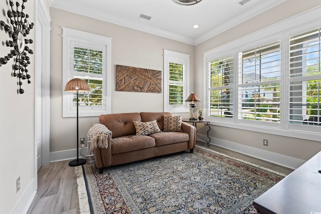 1006 Surf Pointe Dr, North Myrtle Beach, SC 29582 - living area with wood finished floors, ornamental molding, and baseboards