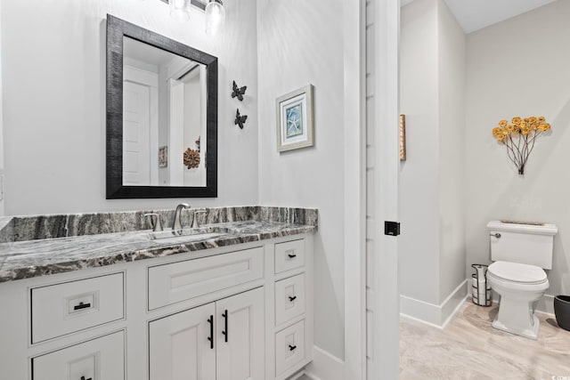 1006 Surf Pointe Dr, North Myrtle Beach, SC 29582 - bathroom featuring baseboards, toilet, and vanity