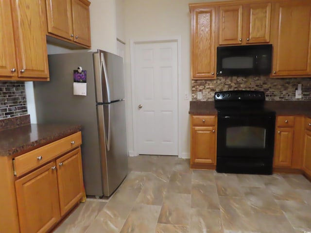 819 Brookline Dr, Myrtle Beach, SC 29579 - kitchen featuring black appliances, decorative backsplash, and dark countertops