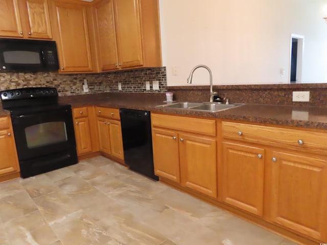 819 Brookline Dr, Myrtle Beach, SC 29579 - kitchen with black appliances, dark countertops, and tasteful backsplash