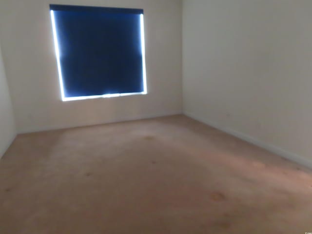 819 Brookline Dr, Myrtle Beach, SC 29579 - unfurnished room with light carpet and baseboards