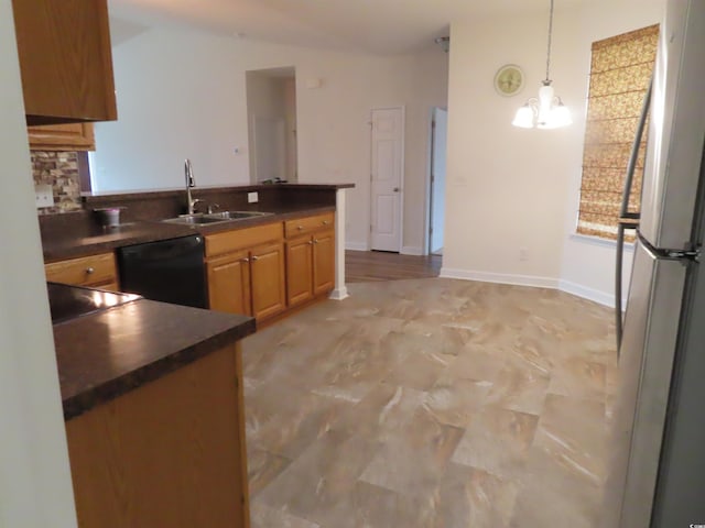 819 Brookline Dr, Myrtle Beach, SC 29579 - kitchen featuring freestanding refrigerator, dishwasher, dark countertops, and a sink
