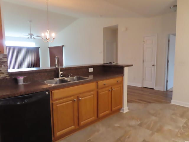 819 Brookline Dr, Myrtle Beach, SC 29579 - kitchen featuring dishwasher, a sink, dark countertops, vaulted ceiling, and pendant lighting