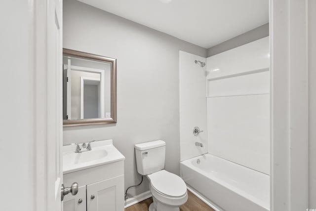 2939 King St, Loris, SC 29569 - full bathroom with vanity, shower / bath combination, toilet, and wood finished floors