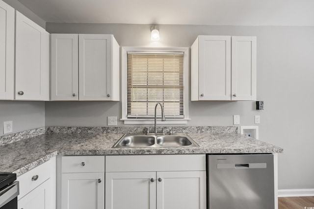kitchen featuring a sink, white cabinets, and appliances with stainless steel finishes