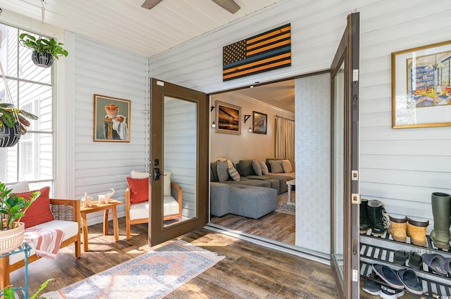 sunroom / solarium featuring a wealth of natural light and french doors