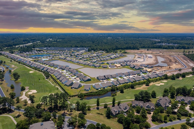 245 Eagle Claw Dr, Calabash, NC 28467 - aerial view at dusk of a water view, a residential view, and golf course view